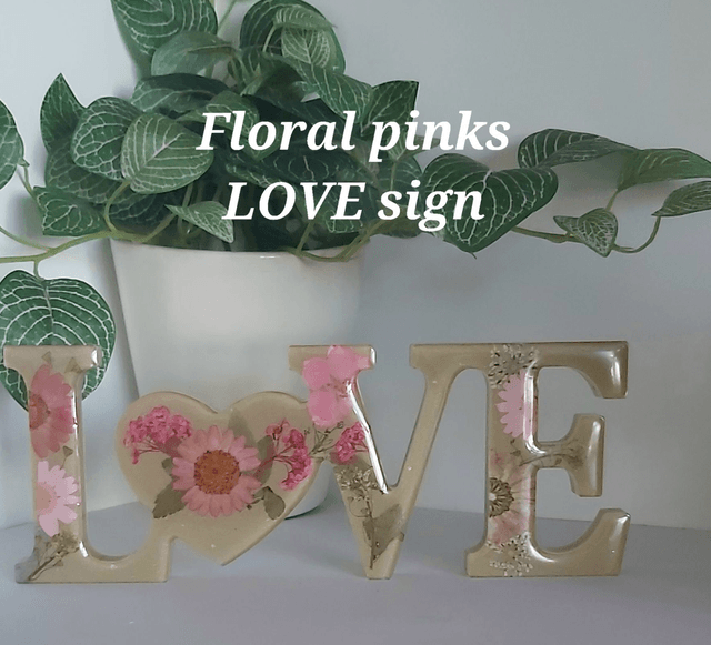 LOVE` signs